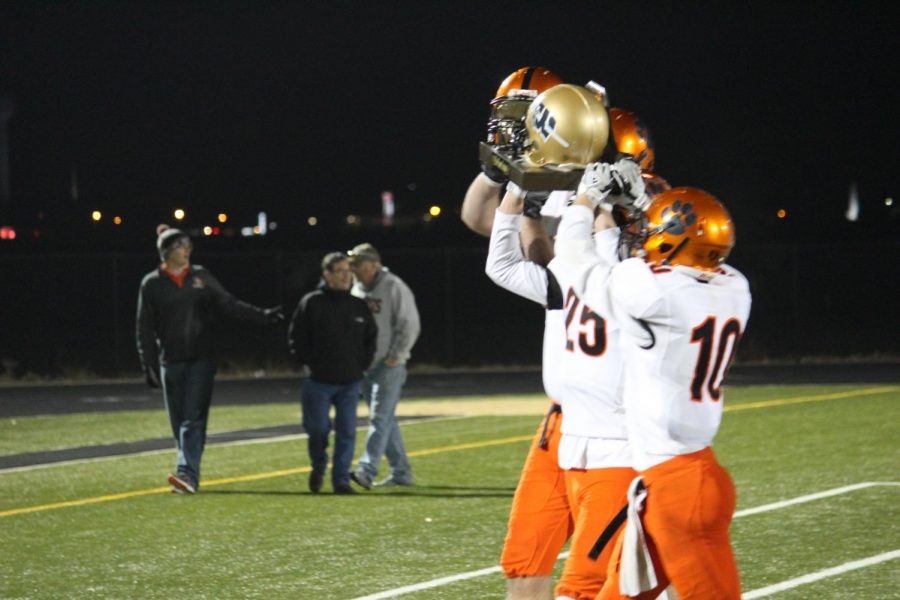 Jaden Gilmore (25) and Jacob Mansdorfer (10) host the Miners Trophy