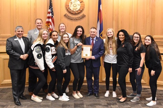 Weld County Board of Commissioners with EHS softball players 
