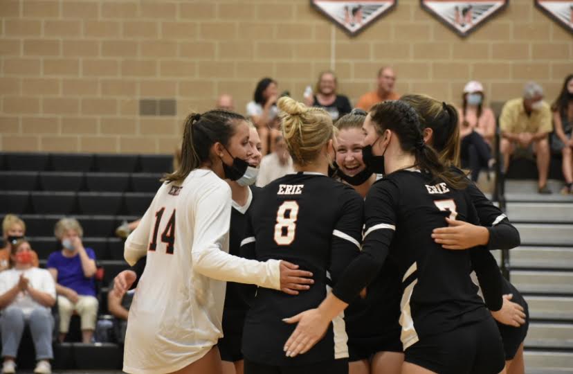 Erie+Volleyball+Varsity+team+huddles+at+a+successful+game+