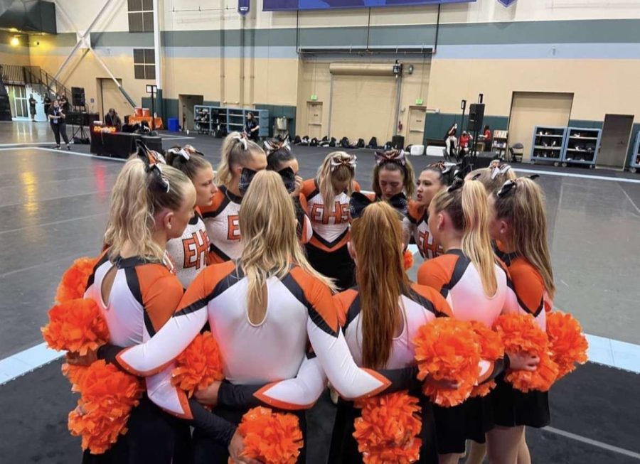 The Lady Tigers ion a team huddle before taking the stage